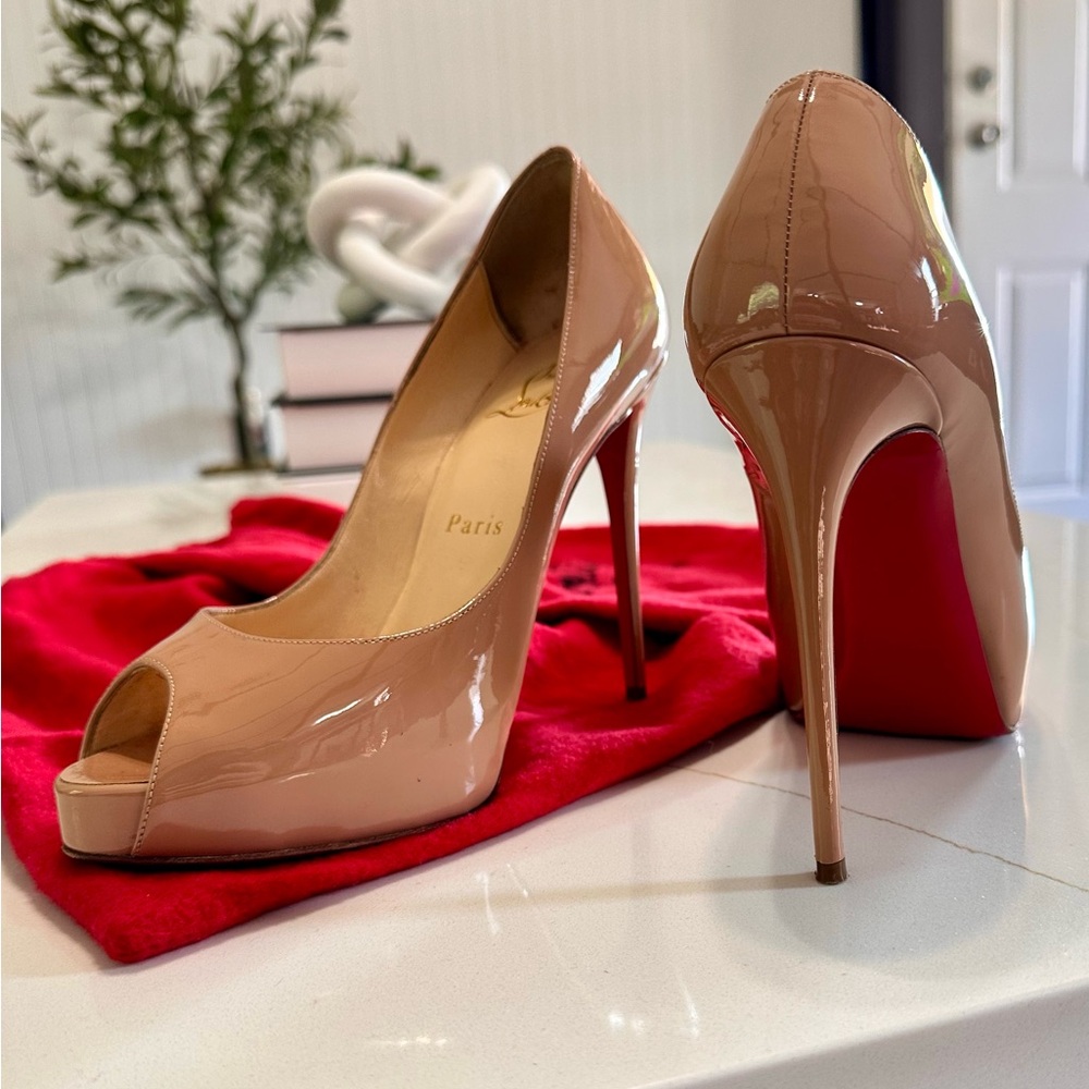 Christian Louboutin Tan Red They were only used once and are as good as new.